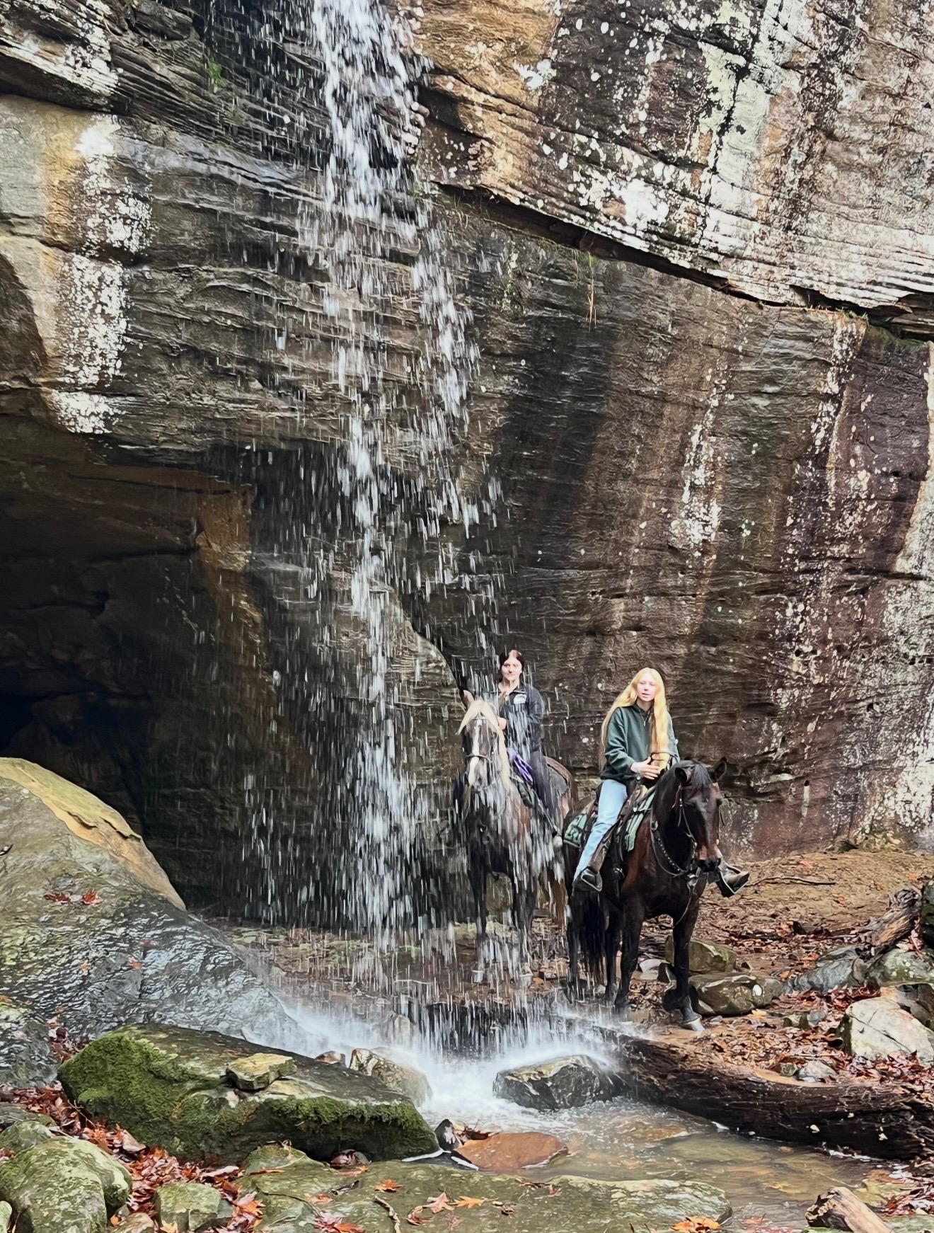 Riders at the waterfall
